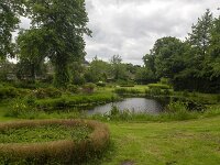 Garden of monumental building Coopersburg, Akkrum, Friesland, Netherlands  Garden of monumental building Coopersburg, Akkrum, Friesland, Netherlands : Coopersburg, architecture, monument, monumental, historic, history, culture, dutch culture, no people, nobody, outside, europe, european, garden, pond, water, tree, pasture, state monument, national heritage site, Akkrum, Friesland, Netherlands