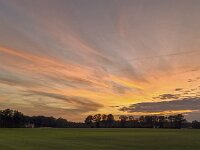 Sunset over rural landscape of eastern part of Dutch province Gelderland  Sunset over rural landscape of eastern part of Dutch province Gelderland : Winterswijk, Achterhoek Gelderland, Netherlands, Dutch, Holland, nature, natural, farm, farmland, grass, grassy, grassland, field, tree, trees, rural landscape, landscape, rural scene, non-urban landscape, non-urban scene, outside, outdoor, outdoors, no people, nobody, summer, summertime, cloud, clouds, cloudy, sky, skyscape, sunset, evening, twilight, red, orange